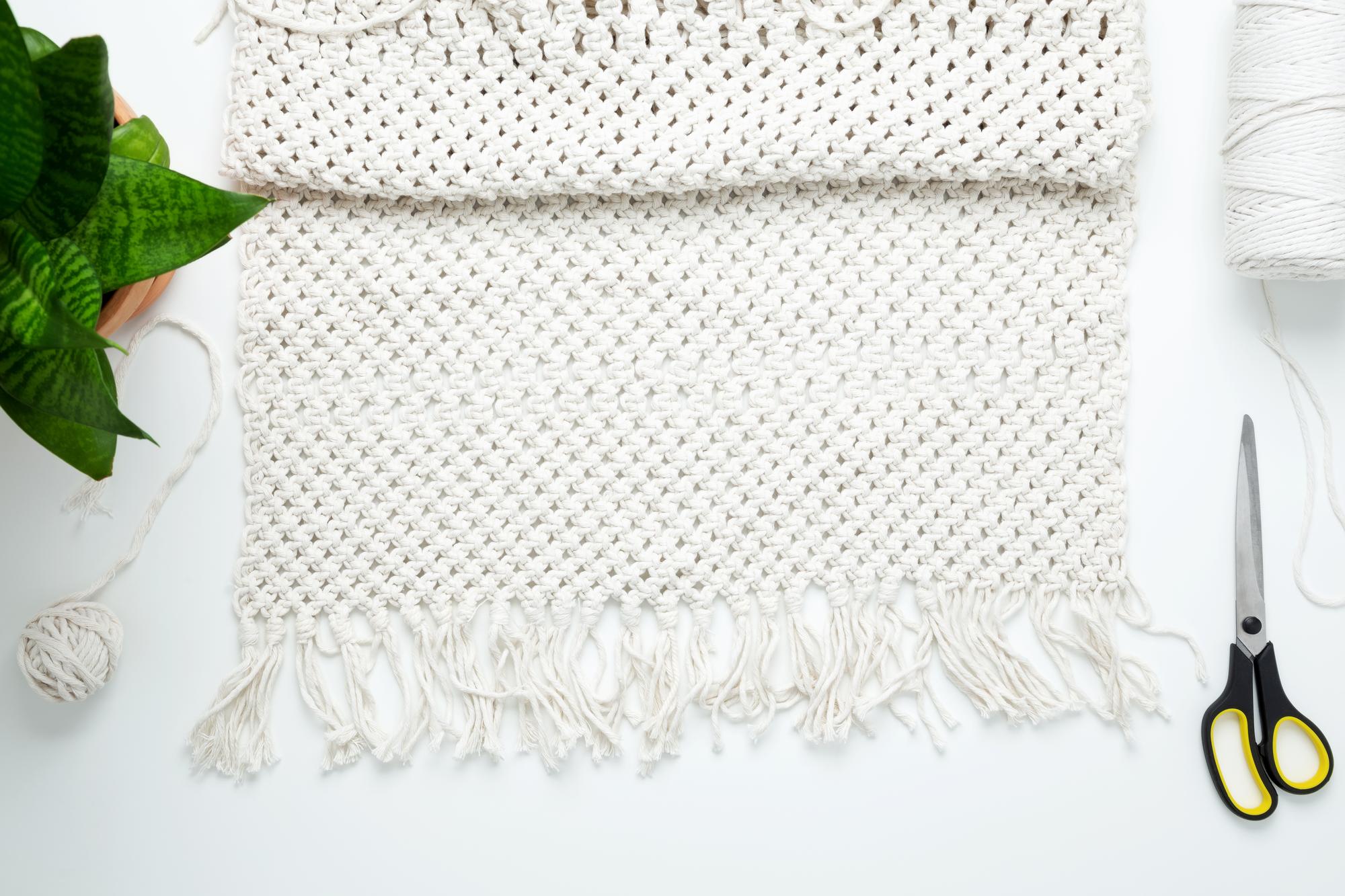 Embroidered linen table runner with floral motif